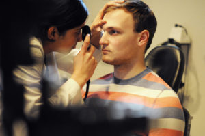 Students worked with faculty from the Department of Ophthalmology to practice eye examinations on standardized patients. 