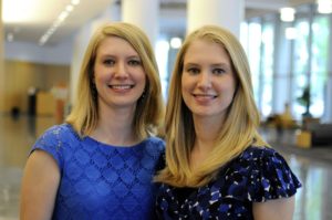 (Left to Right) Adrienne Long, ’15 PhD, examined the use of white blood cells in targeted cancer therapies, and Lauren Smith, ’15 PhD, studied how to use electrical signals in muscle to improve upper limb prosthetics.