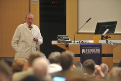 Eric G. Neilson, MD, vice president for medical affairs and Lewis Landsberg Dean, provides a medical school update on Friday, April 19, to a capacity audience inside Hughes Auditorium.