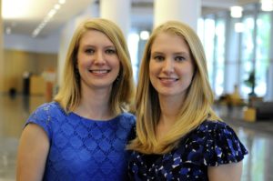 (Left to Right) Adrienne Long, ’15 PhD, examined the use of white blood cells in targeted cancer therapies, and Lauren Smith, ’15 PhD, studied how to use electrical signals in muscle to improve upper limb prosthetics.  