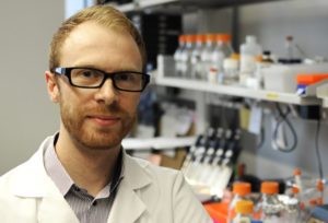 Douglas Wilcox, a student in the Medical Scientist Training Program, studies how the herpes simplex virus causes severe disease and encephalitis in newborns. 