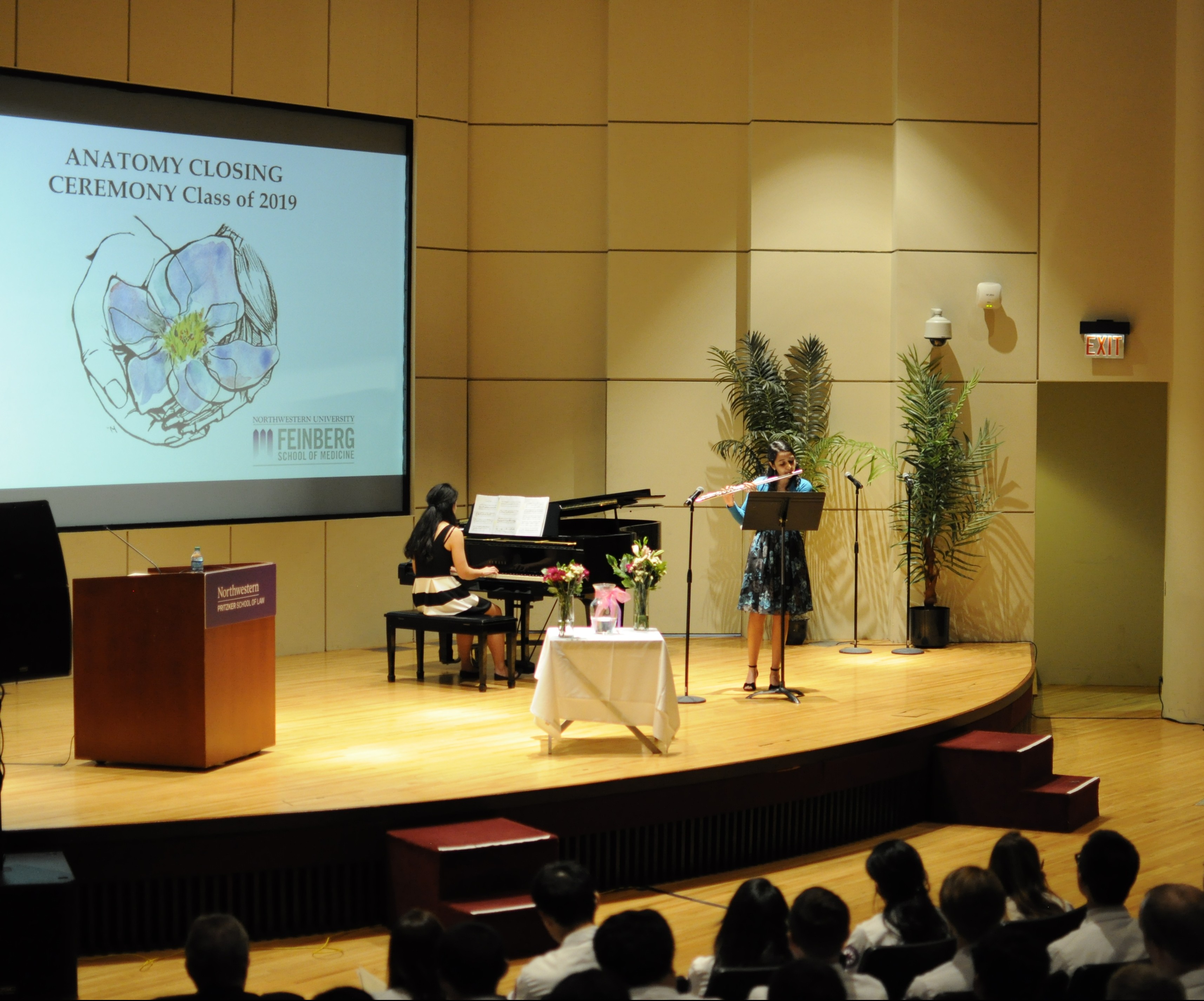 Supriya Immanemi played “Andante in C Major K. 315” by W. A. Mozart on flute with Tonia Cao on piano, during a ceremony to pay tribute to the people who donated their bodies for their anatomy course.