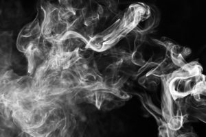 White smoke with black background