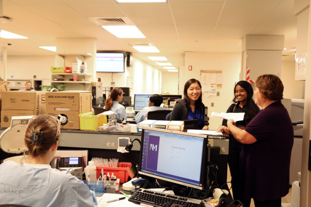 First-year medical students Wenyuan Zhou and Ksheeraja Ravi shadowed Lori Schmidt, transfusion safety officer and blood management coordinator at Northwestern Memorial Hospital.