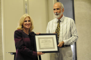 Karla Satchell, PhD, professor of Microbiology-Immunology, was awarded the Dean’s teaching award by Steve Anderson, PhD, associate director of the Driskill Graduate Program in Life Sciences.  