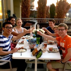 Medical students enjoy a potluck dinner through the student-led program Supper with Six after exams. 