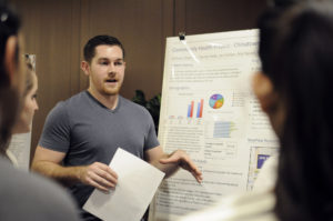 As part of their community health project, first-year medical students presented on the barriers populations in different Chicago neighborhoods face to lead healthy lives.