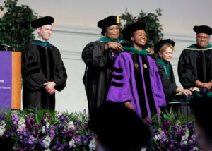 Erinma Paulette Nkechi Ukoha, ’17 MD, MA, was hooded by her mother, Catherine Okoronkwo, MD, during the commencement ceremony. 