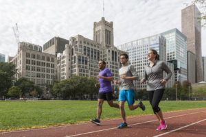 Feinberg students exercise on campus. Photo by Jim Prisching.