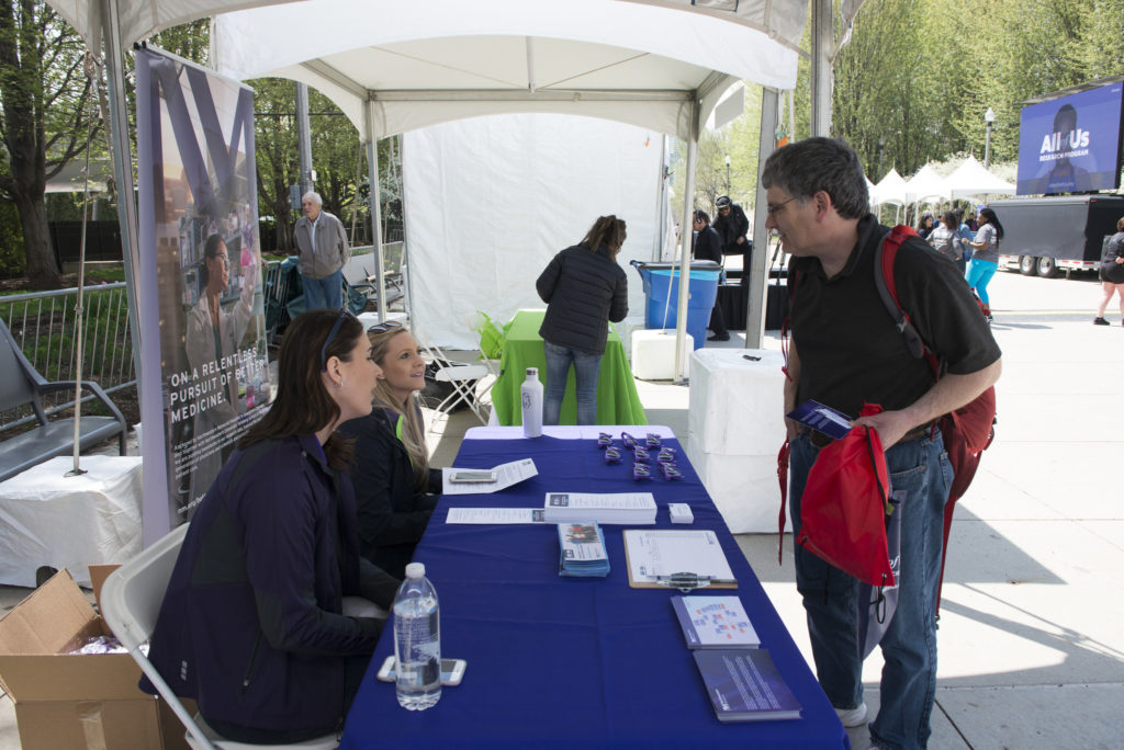 Northwestern Medicine representatives attend the launch event and share information about the All of Us program. Image courtesy of the National Institutes of Health. Photography by Rob Karlic.