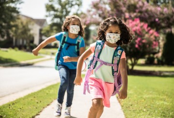 Removing masks ‘is not a winning strategy’ if goal is in-person school