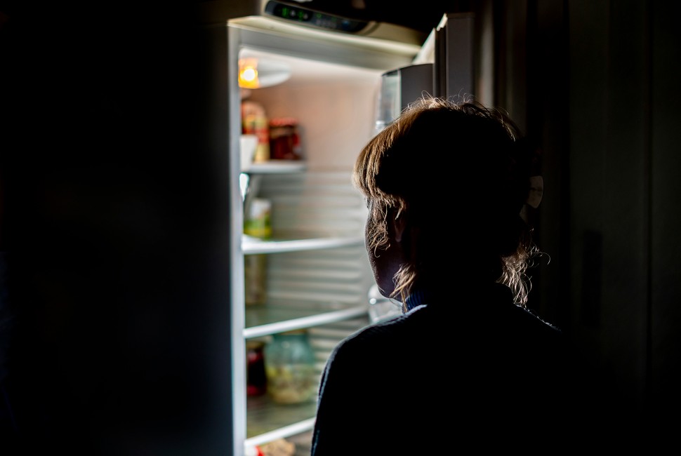 Black Woman Looking Into Fridge For Midnight Snack Stock, 52% OFF