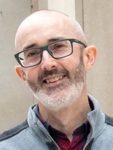 A photo of Derek Walsh, PhD, professor of Microbiology-Immunology.