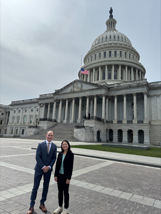 A photo of Lilian Bui, ‘25 MD, ’25 MPH, with Ron Ackermann, MD, MPH, director of the Institute for Public Health and Medicine (IPHAM), at Capitol Hill.