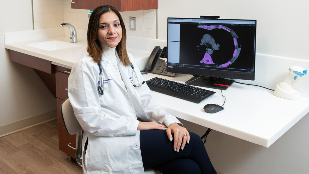 Sadiya Khan, MD, MSc, the Magerstadt Professor of Cardiovascular Epidemiology, reviewing a CT scan to evaluate risk of heart disease.