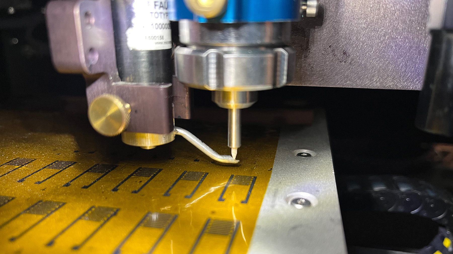 An aerosol jet printer in Hersam's laboratory deposits electronic inks onto a flexible polymer substrate. (Northwestern University)
